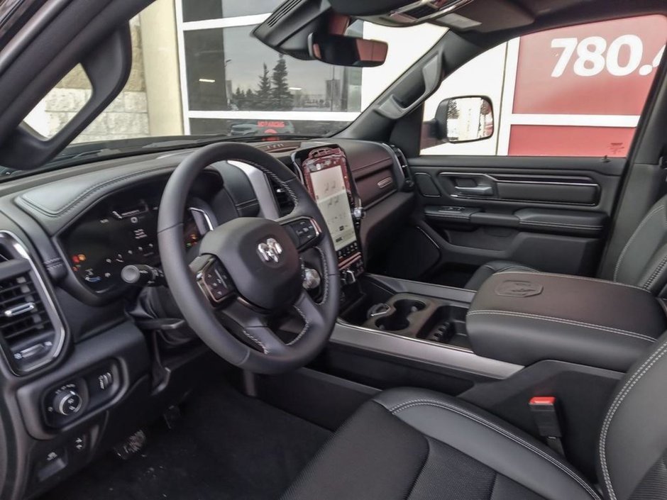 2024 Ram 1500 SPORT IN DIAMOND BLACK EQUIPPED WITH A 5.7L HEMI V8 W/ETORQUE , 4X4 , 8SPD AUTO , 125L TANK , SPORT HOOD , PANORAMIC SUNROOF , R-11
