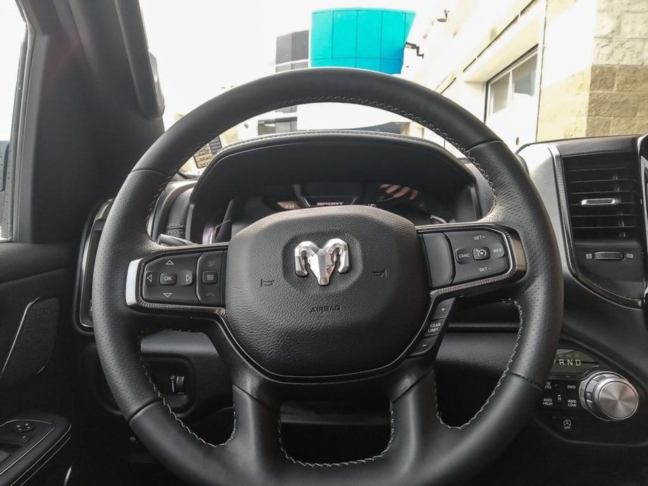 2024 Ram 1500 SPORT IN DIAMOND BLACK EQUIPPED WITH A 5.7L HEMI V8 W/ETORQUE , 4X4 , 8SPD AUTO , 125L TANK , SPORT HOOD , PANORAMIC SUNROOF , R-12