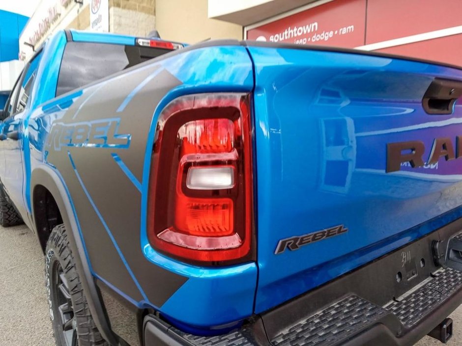 2025 Ram 1500 REBEL IN HYDRO BLUE EQUIPPED WITH A 3.0L TWIN TURBO I6 , 4X4 , 8SPD AUTO , PERF SHOCKS , CLOTH/VINYL BUCKET SEATS-10