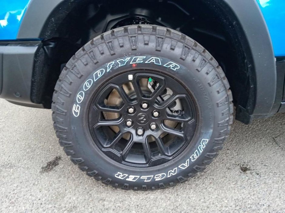 2025 Ram 1500 REBEL IN HYDRO BLUE EQUIPPED WITH A 3.0L TWIN TURBO I6 , 4X4 , 8SPD AUTO , PERF SHOCKS , CLOTH/VINYL BUCKET SEATS-5