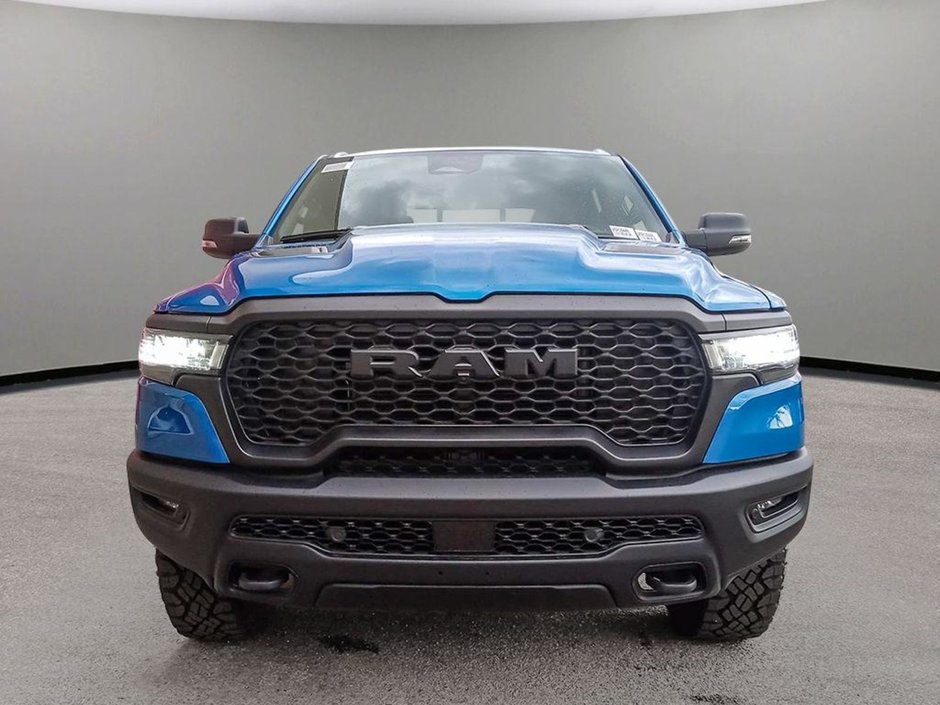 2025 Ram 1500 REBEL IN HYDRO BLUE EQUIPPED WITH A 3.0L TWIN TURBO I6 , 4X4 , 8SPD AUTO , PERF SHOCKS , CLOTH/VINYL BUCKET SEATS-1