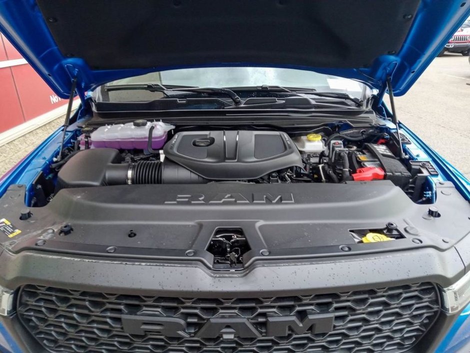 2025 Ram 1500 REBEL IN HYDRO BLUE EQUIPPED WITH A 3.0L TWIN TURBO I6 , 4X4 , 8SPD AUTO , PERF SHOCKS , CLOTH/VINYL BUCKET SEATS-9