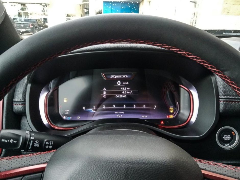 2025 Ram 1500 REBEL IN HYDRO BLUE EQUIPPED WITH A 3.0L TWIN TURBO I6 , 4X4 , 8SPD AUTO , PERF SHOCKS , CLOTH/VINYL BUCKET SEATS-13