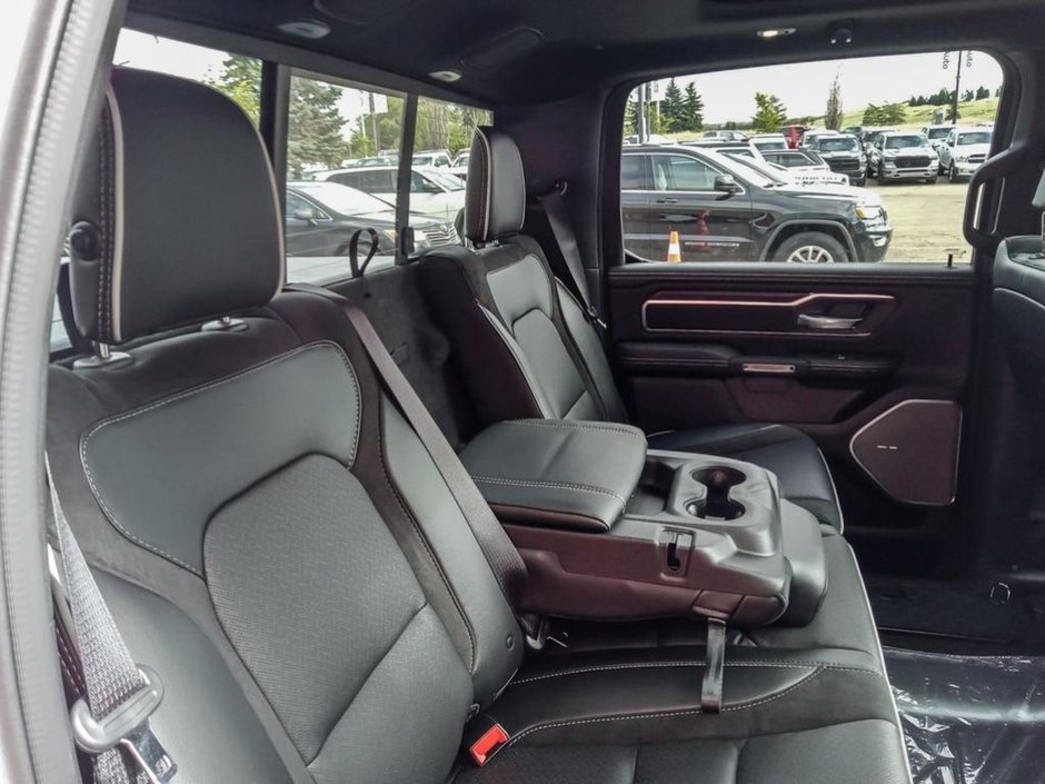 2025 Ram 1500 LARAMIE IN BRIGHT WHITE EUQIPPED WITH A 3.0L TWIN TUBRO I6 , 4X4 , 8SPD AUTO , HANDS FREE DRIVING ASSIST , AIR SUSPENSION , 125L-21