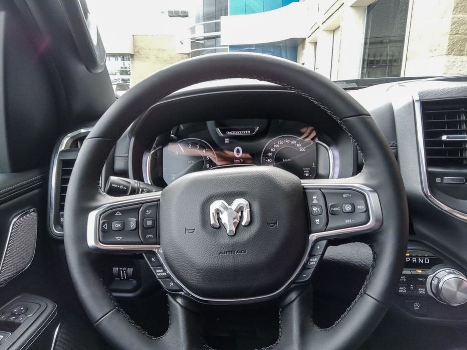 2025 Ram 1500 LARAMIE IN BRIGHT WHITE EUQIPPED WITH A 3.0L TWIN TUBRO I6 , 4X4 , 8SPD AUTO , HANDS FREE DRIVING ASSIST , AIR SUSPENSION , 125L-12