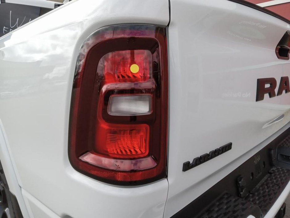 2025 Ram 1500 LARAMIE IN BRIGHT WHITE EUQIPPED WITH A 3.0L TWIN TUBRO I6 , 4X4 , 8SPD AUTO , HANDS FREE DRIVING ASSIST , AIR SUSPENSION , 125L-10