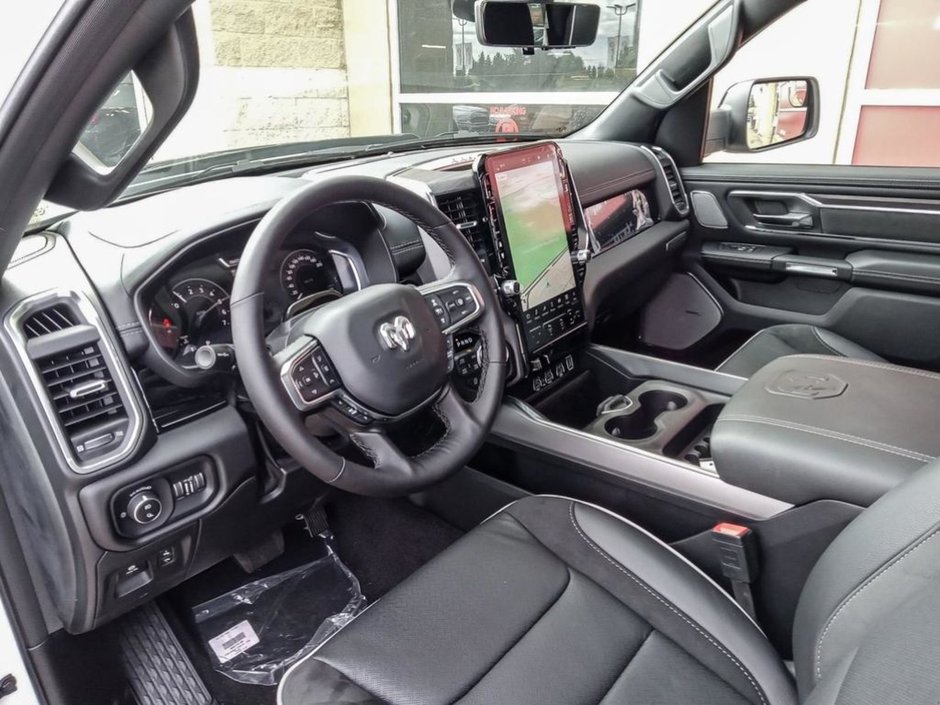 2025 Ram 1500 LARAMIE IN BRIGHT WHITE EUQIPPED WITH A 3.0L TWIN TUBRO I6 , 4X4 , 8SPD AUTO , HANDS FREE DRIVING ASSIST , AIR SUSPENSION , 125L-11