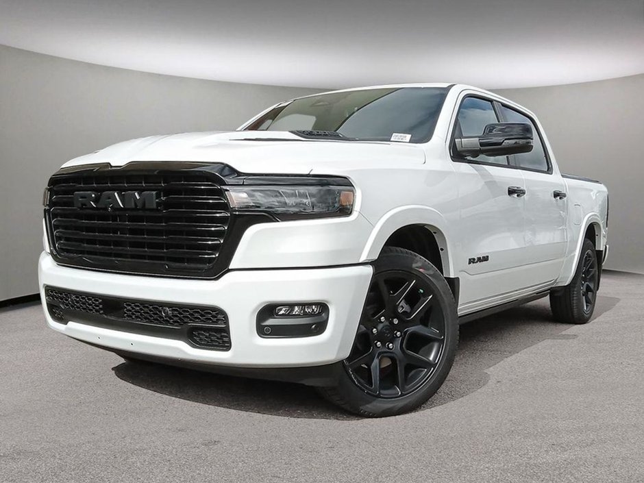 2025 Ram 1500 LARAMIE IN BRIGHT WHITE EUQIPPED WITH A 3.0L TWIN TUBRO I6 , 4X4 , 8SPD AUTO , HANDS FREE DRIVING ASSIST , AIR SUSPENSION , 125L-0