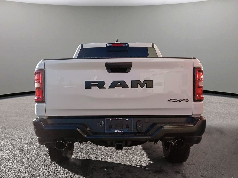 2025 Ram 1500 WARLOCK IN BRIGHT WHITE EQUIPPED WITH A 3.0L TWIN TURBO HURRICANE I6 , 4X4 , 8SPD AUTO , E-LOCKER REAR AXLE , BACKUP CAM , PERF-4