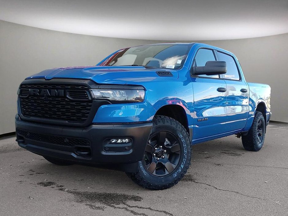 2025 Ram 1500 WARLOCK IN HYDRO BLUE EQUIPPED WITH A 3.0L TWIN TUBRO HURRICANE I6 , 4X4 , 8SPD AUTO , E LOCKER REAR AXLE , BACKUP CAM , PERF SH-0