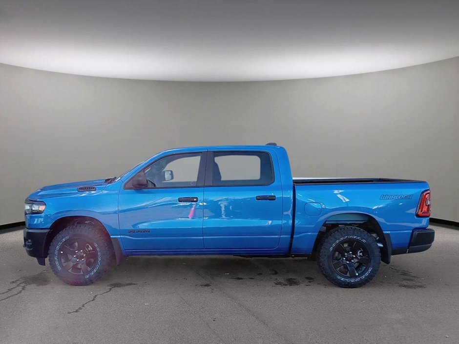 2025 Ram 1500 WARLOCK IN HYDRO BLUE EQUIPPED WITH A 3.0L TWIN TUBRO HURRICANE I6 , 4X4 , 8SPD AUTO , E LOCKER REAR AXLE , BACKUP CAM , PERF SH-2