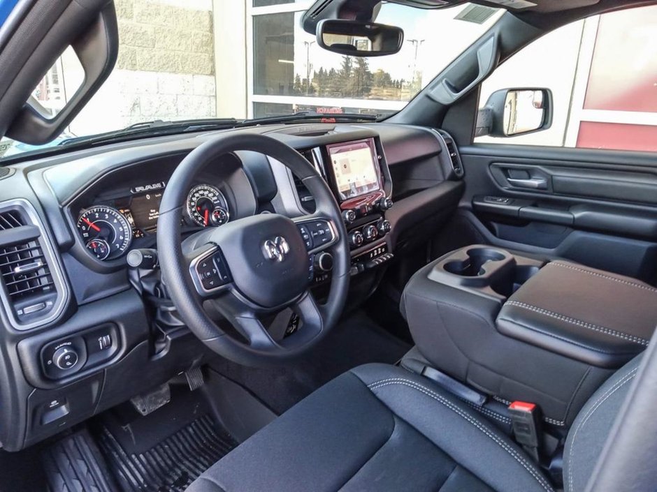 2025 Ram 1500 WARLOCK IN HYDRO BLUE EQUIPPED WITH A 3.0L TWIN TUBRO HURRICANE I6 , 4X4 , 8SPD AUTO , E LOCKER REAR AXLE , BACKUP CAM , PERF SH-11