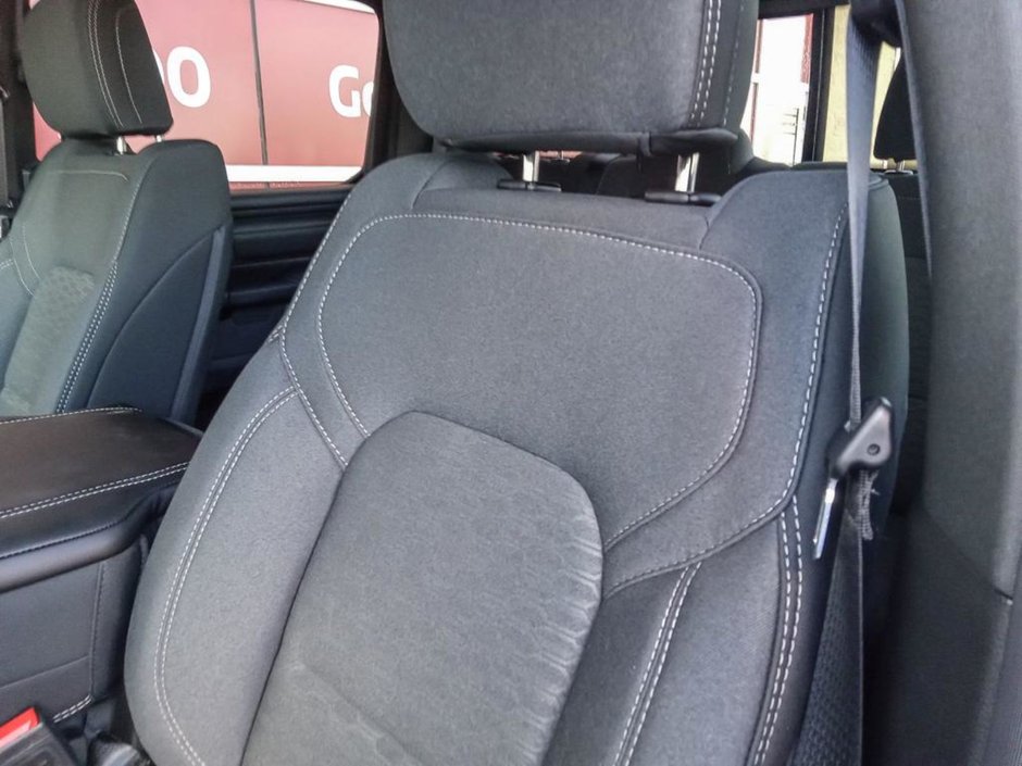 2025 Ram 1500 WARLOCK IN HYDRO BLUE EQUIPPED WITH A 3.0L TWIN TUBRO HURRICANE I6 , 4X4 , 8SPD AUTO , E LOCKER REAR AXLE , BACKUP CAM , PERF SH-18