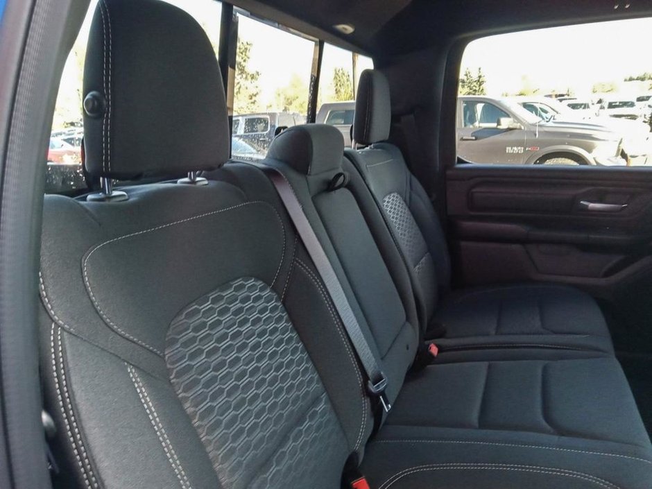 2025 Ram 1500 WARLOCK IN HYDRO BLUE EQUIPPED WITH A 3.0L TWIN TUBRO HURRICANE I6 , 4X4 , 8SPD AUTO , E LOCKER REAR AXLE , BACKUP CAM , PERF SH-21