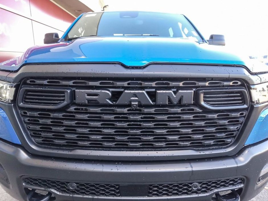 2025 Ram 1500 WARLOCK IN HYDRO BLUE EQUIPPED WITH A 3.0L TWIN TUBRO HURRICANE I6 , 4X4 , 8SPD AUTO , E LOCKER REAR AXLE , BACKUP CAM , PERF SH-8