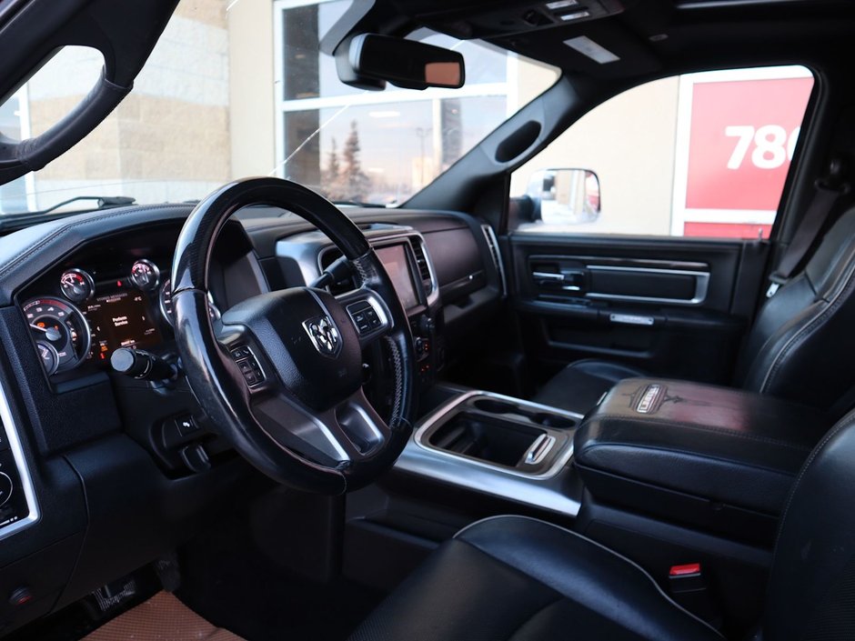 2017 Ram 2500 LIMITED MEGA CAB IN RED PEARL EQUIPPED WITH A 6.7L CUMMINS TURBO DIESEL I6 , 4X4 , 6SPD AUTO , REAR AUTO LVL AIR SUSPENSION , SU-15