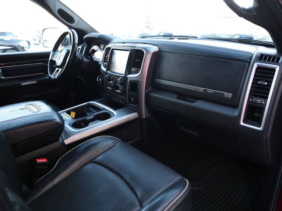 2017 Ram 2500 LIMITED MEGA CAB IN RED PEARL EQUIPPED WITH A 6.7L CUMMINS TURBO DIESEL I6 , 4X4 , 6SPD AUTO , REAR AUTO LVL AIR SUSPENSION , SU-21