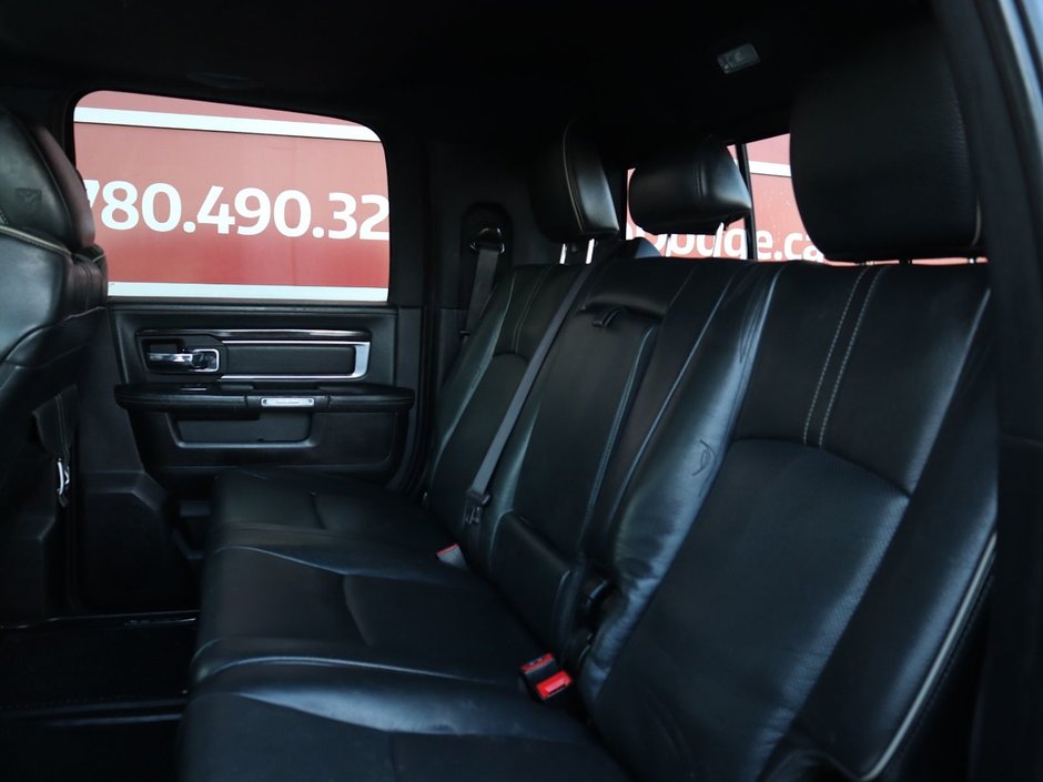 2017 Ram 2500 LIMITED MEGA CAB IN RED PEARL EQUIPPED WITH A 6.7L CUMMINS TURBO DIESEL I6 , 4X4 , 6SPD AUTO , REAR AUTO LVL AIR SUSPENSION , SU-20