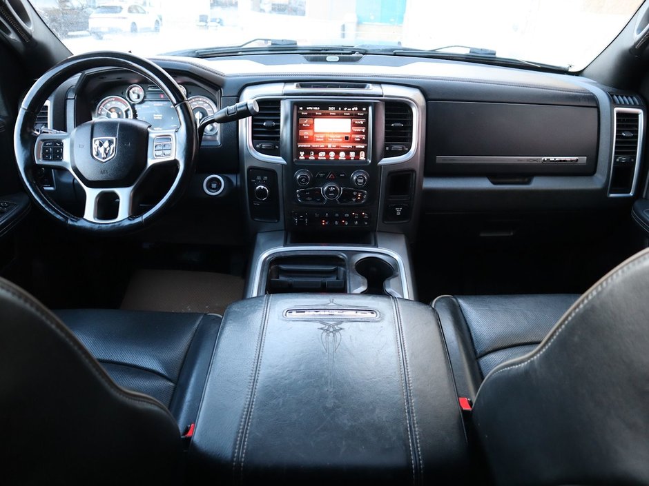 2017 Ram 2500 LIMITED MEGA CAB IN RED PEARL EQUIPPED WITH A 6.7L CUMMINS TURBO DIESEL I6 , 4X4 , 6SPD AUTO , REAR AUTO LVL AIR SUSPENSION , SU-23