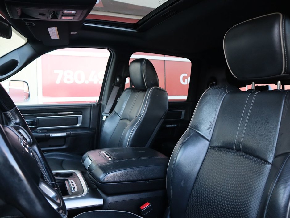 2017 Ram 2500 LIMITED MEGA CAB IN RED PEARL EQUIPPED WITH A 6.7L CUMMINS TURBO DIESEL I6 , 4X4 , 6SPD AUTO , REAR AUTO LVL AIR SUSPENSION , SU-18