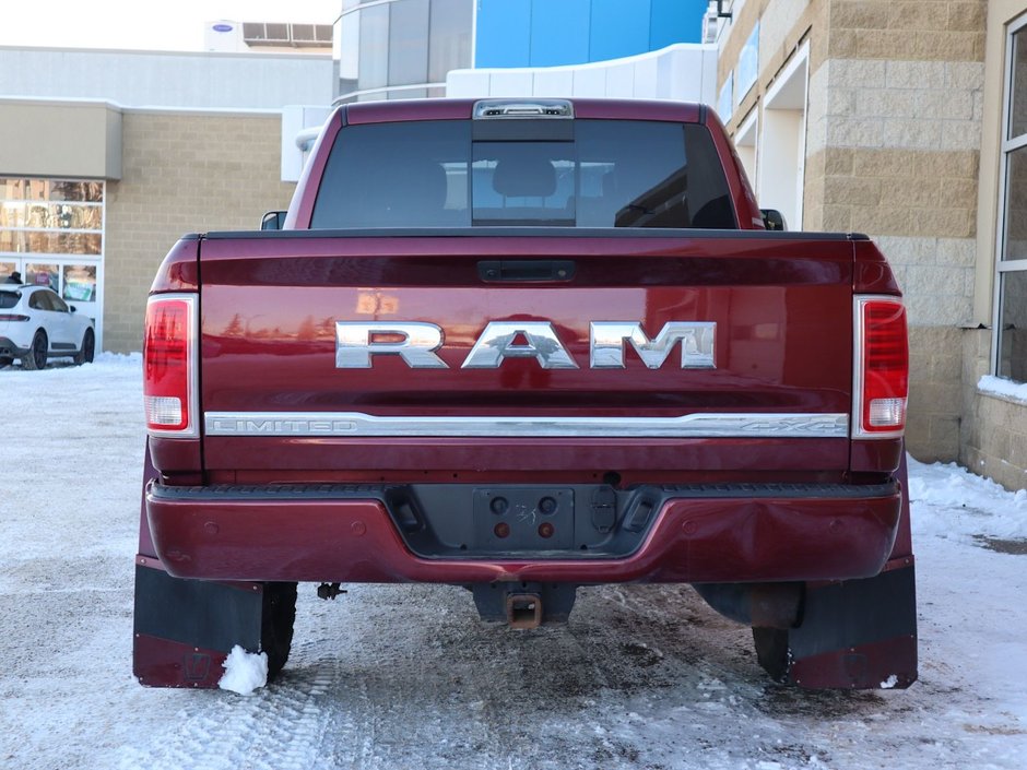 2017 Ram 2500 LIMITED MEGA CAB IN RED PEARL EQUIPPED WITH A 6.7L CUMMINS TURBO DIESEL I6 , 4X4 , 6SPD AUTO , REAR AUTO LVL AIR SUSPENSION , SU-8