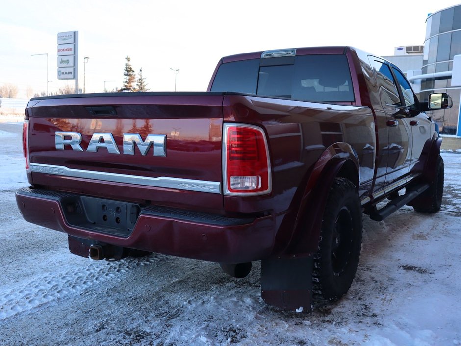 2017 Ram 2500 LIMITED MEGA CAB IN RED PEARL EQUIPPED WITH A 6.7L CUMMINS TURBO DIESEL I6 , 4X4 , 6SPD AUTO , REAR AUTO LVL AIR SUSPENSION , SU-9