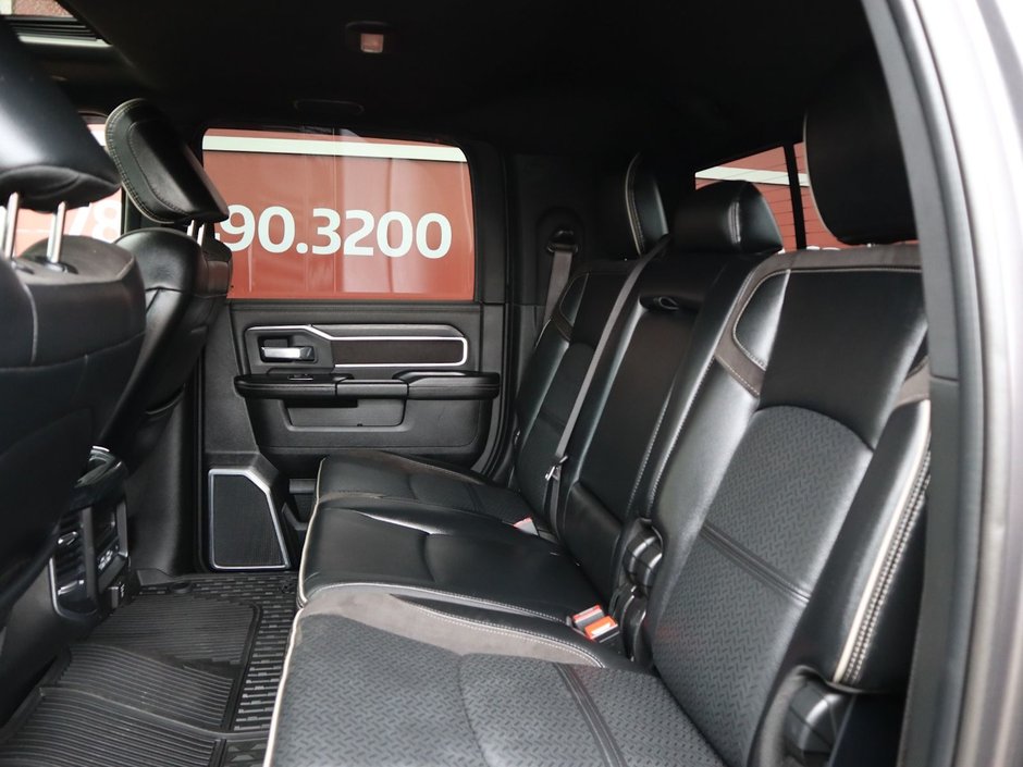 2023 Ram 2500 LARAMIE MEGA CAB NIGHT EDITION IN GRANITE CRYSTAL EQUIPPED WITH A 6.7L CUMMINS TURBO DIESEL I6 , 4X4 , 6SPD AUTO , SUNROOF , LAR-23