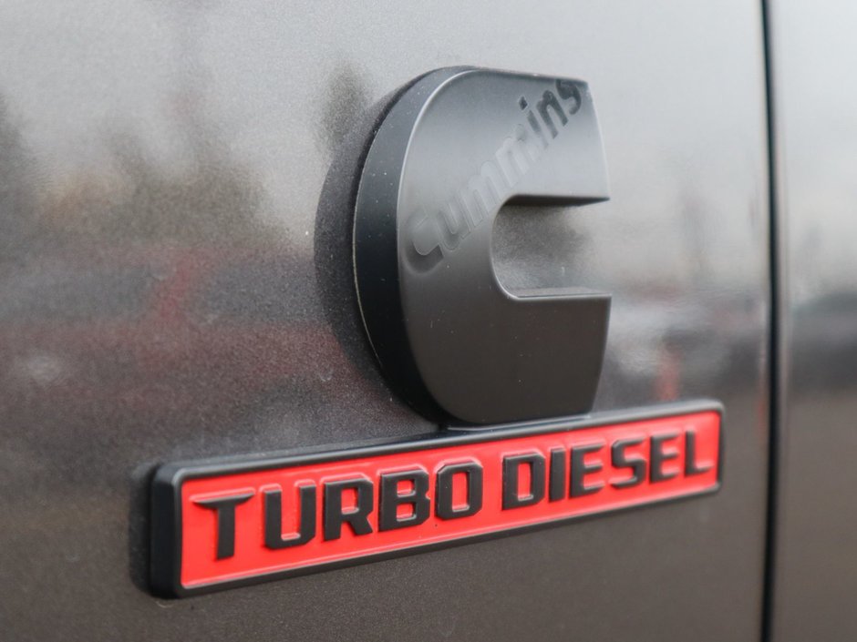 2023 Ram 2500 LARAMIE MEGA CAB NIGHT EDITION IN GRANITE CRYSTAL EQUIPPED WITH A 6.7L CUMMINS TURBO DIESEL I6 , 4X4 , 6SPD AUTO , SUNROOF , LAR-12