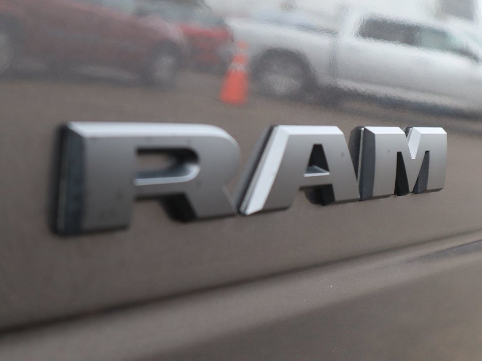 2023 Ram 2500 LARAMIE MEGA CAB NIGHT EDITION IN GRANITE CRYSTAL EQUIPPED WITH A 6.7L CUMMINS TURBO DIESEL I6 , 4X4 , 6SPD AUTO , SUNROOF , LAR-13
