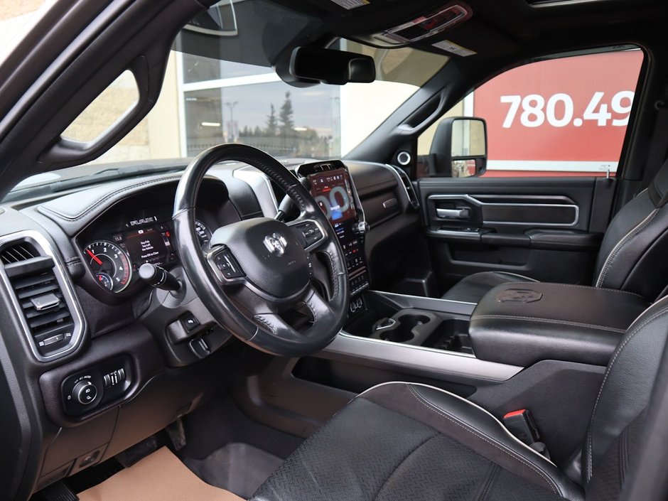 2023 Ram 2500 LARAMIE MEGA CAB NIGHT EDITION IN GRANITE CRYSTAL EQUIPPED WITH A 6.7L CUMMINS TURBO DIESEL I6 , 4X4 , 6SPD AUTO , SUNROOF , LAR-17