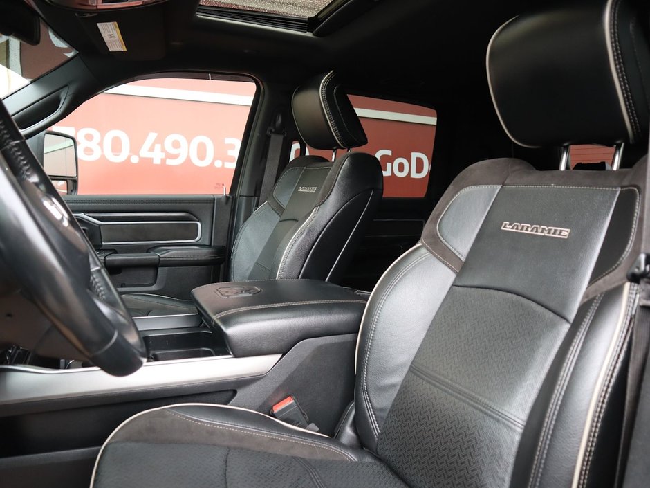 2023 Ram 2500 LARAMIE MEGA CAB NIGHT EDITION IN GRANITE CRYSTAL EQUIPPED WITH A 6.7L CUMMINS TURBO DIESEL I6 , 4X4 , 6SPD AUTO , SUNROOF , LAR-20