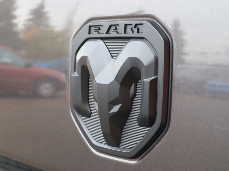 2023 Ram 2500 LARAMIE MEGA CAB NIGHT EDITION IN GRANITE CRYSTAL EQUIPPED WITH A 6.7L CUMMINS TURBO DIESEL I6 , 4X4 , 6SPD AUTO , SUNROOF , LAR-14