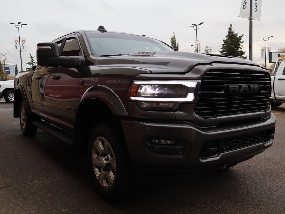 2023 Ram 2500 LARAMIE MEGA CAB NIGHT EDITION IN GRANITE CRYSTAL EQUIPPED WITH A 6.7L CUMMINS TURBO DIESEL I6 , 4X4 , 6SPD AUTO , SUNROOF , LAR-10