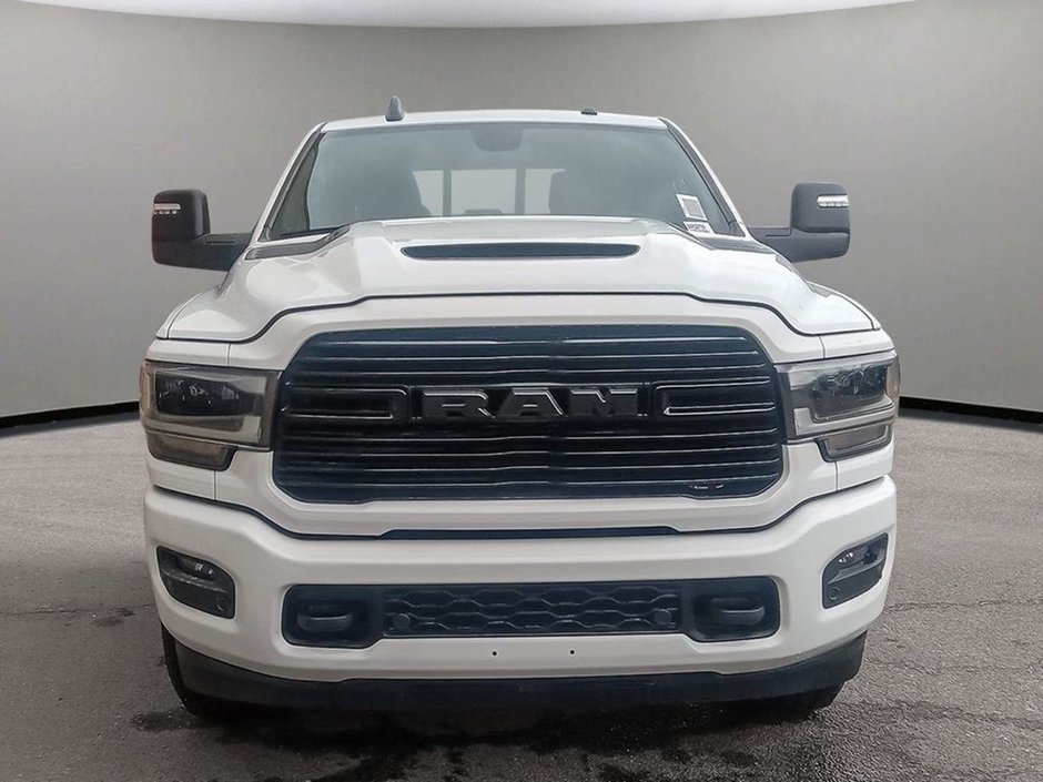 2024 Ram 2500 LARAMIE NIGHT EDITION IN BRIGHT WHITE EQUIPPED WITH A 6.7L CUMMINS TURBO DIESEL I6 , 4X4 , 6SPD AUTO , SUNROOF , LARAIE LEVEL B-1