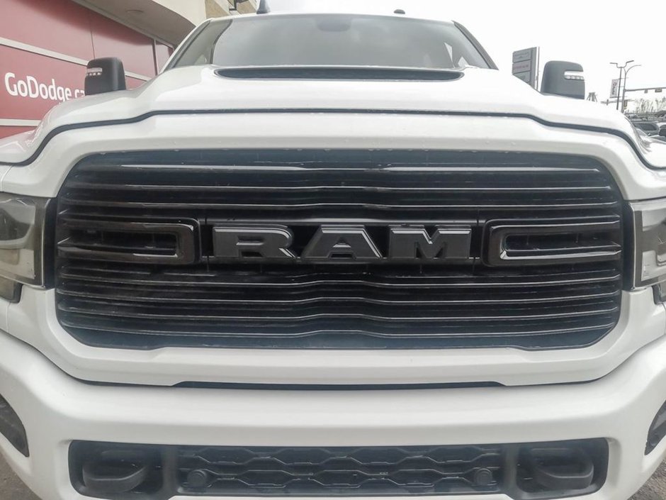 2024 Ram 2500 LARAMIE NIGHT EDITION IN BRIGHT WHITE EQUIPPED WITH A 6.7L CUMMINS TURBO DIESEL I6 , 4X4 , 6SPD AUTO , SUNROOF , LARAIE LEVEL B-8