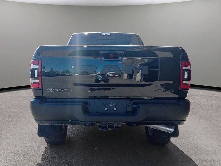 2024 Ram 2500 REBEL IN DIAMOND BLACK EQUIPPED WITH A 6.7L CUMMINS TURBO DIESEL , 6SPD AUTO , 4X4 , TOWING TECH GROUP , LVL 1 EQUIPMENT , 20INC-4