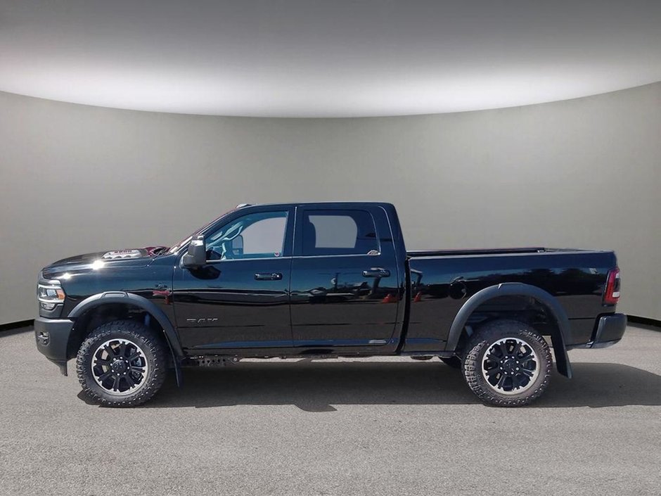 2024 Ram 2500 REBEL IN DIAMOND BLACK EQUIPPED WITH A 6.7L CUMMINS TURBO DIESEL , 6SPD AUTO , 4X4 , TOWING TECH GROUP , LVL 1 EQUIPMENT , 20INC-2