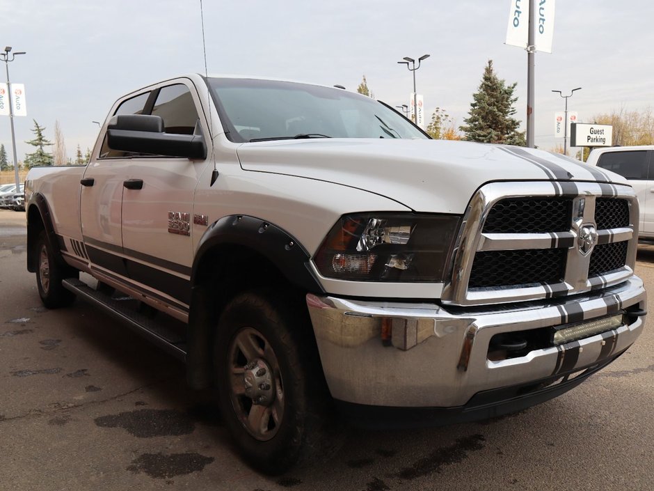 2016 Ram 3500 SLT IN BRIGHT WHITE EQUIPPED WITH A 5.7L HEMI V8 , 4X4 , 6 SPD AUTO , 6SPEAKER AUDIO , PWR WINDOWS/LOCKS , AC , CRUISE-10