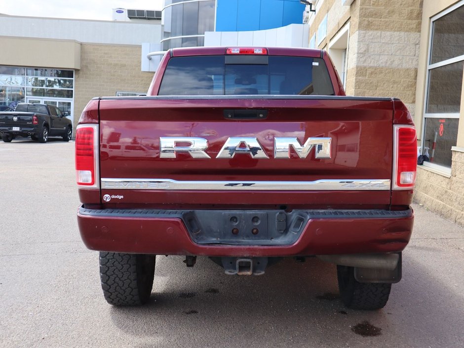 2018 Ram 3500 LIMITED IN RED PEARL EQUIPPED WITH A 6.7L CUMMINS TURBO DIESEL I6 , 4X4 , 6SPD AUTO , RUNNING BOARDS , 5TH WHEEL & GOOSENECK TOW-8