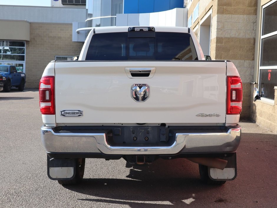 2022 Ram 3500 LONGHORN IN PEARL WHITE EQUIPPED WITH A 6.7L CUMMINS TURBO DIESEL , 4X4 , 6SPD AISIN HD AUTO , ADAPTIVE STEERING , REAR AUTO LVL-8