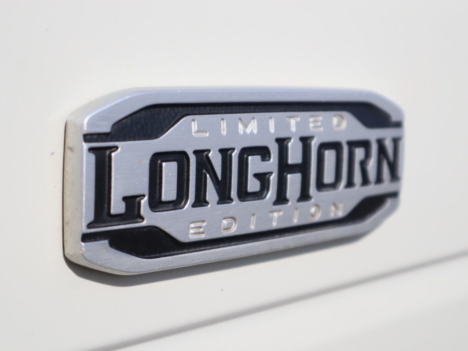 2022 Ram 3500 LONGHORN IN PEARL WHITE EQUIPPED WITH A 6.7L CUMMINS TURBO DIESEL , 4X4 , 6SPD AISIN HD AUTO , ADAPTIVE STEERING , REAR AUTO LVL-14