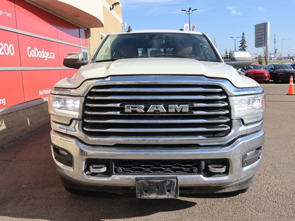 2022 Ram 3500 LONGHORN IN PEARL WHITE EQUIPPED WITH A 6.7L CUMMINS TURBO DIESEL , 4X4 , 6SPD AISIN HD AUTO , ADAPTIVE STEERING , REAR AUTO LVL-1