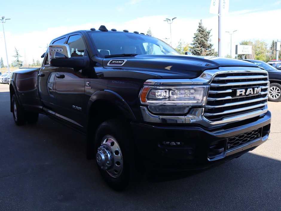 2023 Ram 3500 LIMITED LONGHORN IN DIAMOND BLACK EQUIPPED WITH A 6.7L HO CUMMINS TUBRO DIESEL I6 , 4X4 , 6SPD AISIN HD AUTO , DUALLY , REAR AUT-10