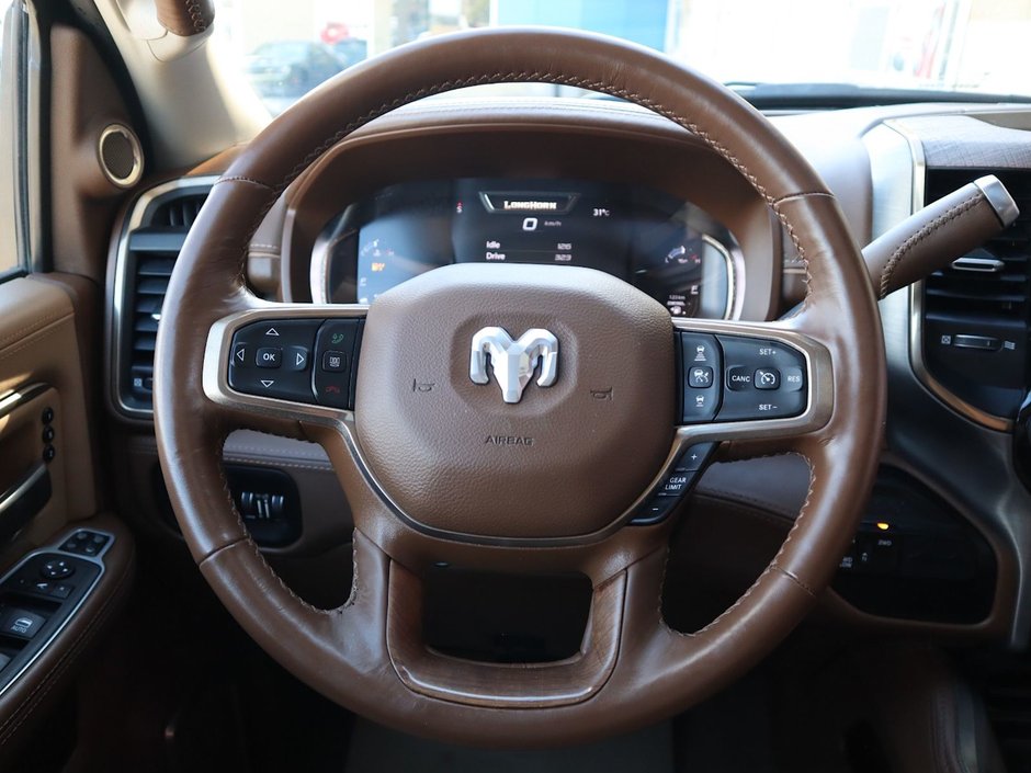 2023 Ram 3500 LIMITED LONGHORN IN DIAMOND BLACK EQUIPPED WITH A 6.7L HO CUMMINS TUBRO DIESEL I6 , 4X4 , 6SPD AISIN HD AUTO , DUALLY , REAR AUT-31