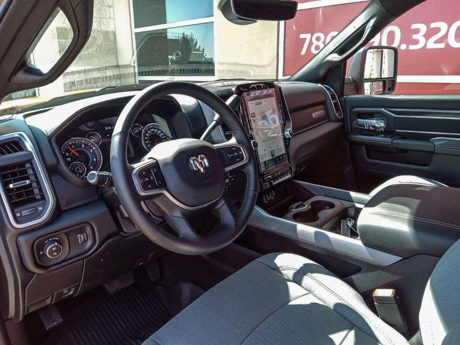 2024 Ram 3500 BIG HORN IN OMAHA ORANGE EQUIPPED WITH A 6.7L CUMMINS HO TURBO DIESEL I6 , 4X4 , 6SPD AISIN HD AUTO , 12INCH W/NAV , ALPINE AUDI-11