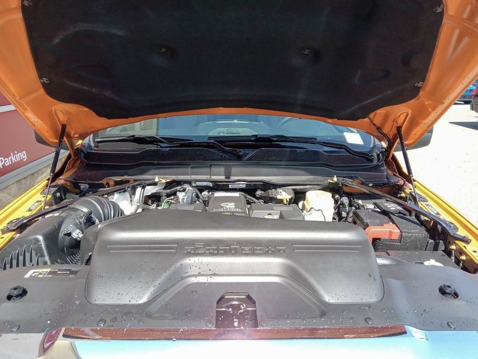 2024 Ram 3500 BIG HORN IN OMAHA ORANGE EQUIPPED WITH A 6.7L CUMMINS HO TURBO DIESEL I6 , 4X4 , 6SPD AISIN HD AUTO , 12INCH W/NAV , ALPINE AUDI-9