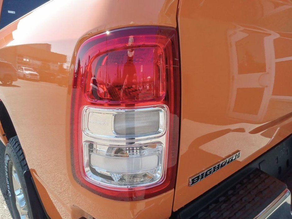 2024 Ram 3500 BIG HORN IN OMAHA ORANGE EQUIPPED WITH A 6.7L CUMMINS HO TURBO DIESEL I6 , 4X4 , 6SPD AISIN HD AUTO , 12INCH W/NAV , ALPINE AUDI-10