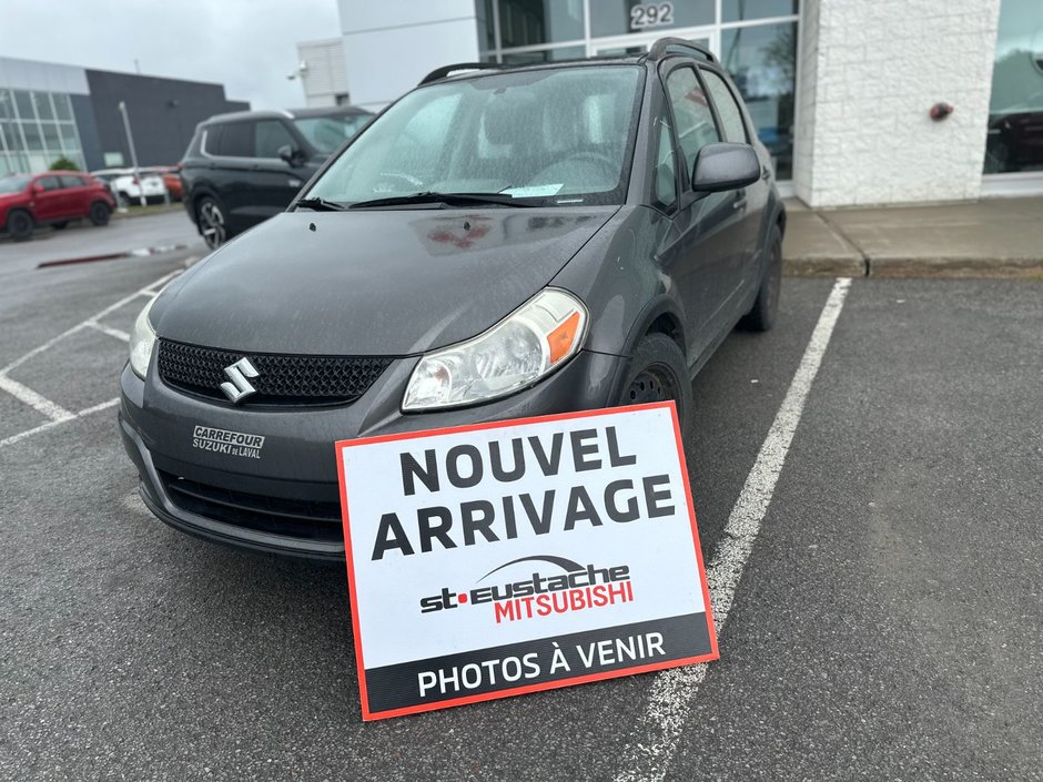 2012 Suzuki SX4 Hatchback JX**4X4/AWD**BAS KM!**AUTOMATIQUE**CRUISE**RADIO in Saint-Eustache, Quebec - w940px