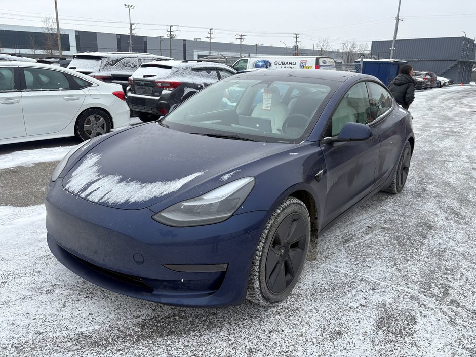 2023 Tesla Model 3 standard range plus in Laval, Quebec - w940px