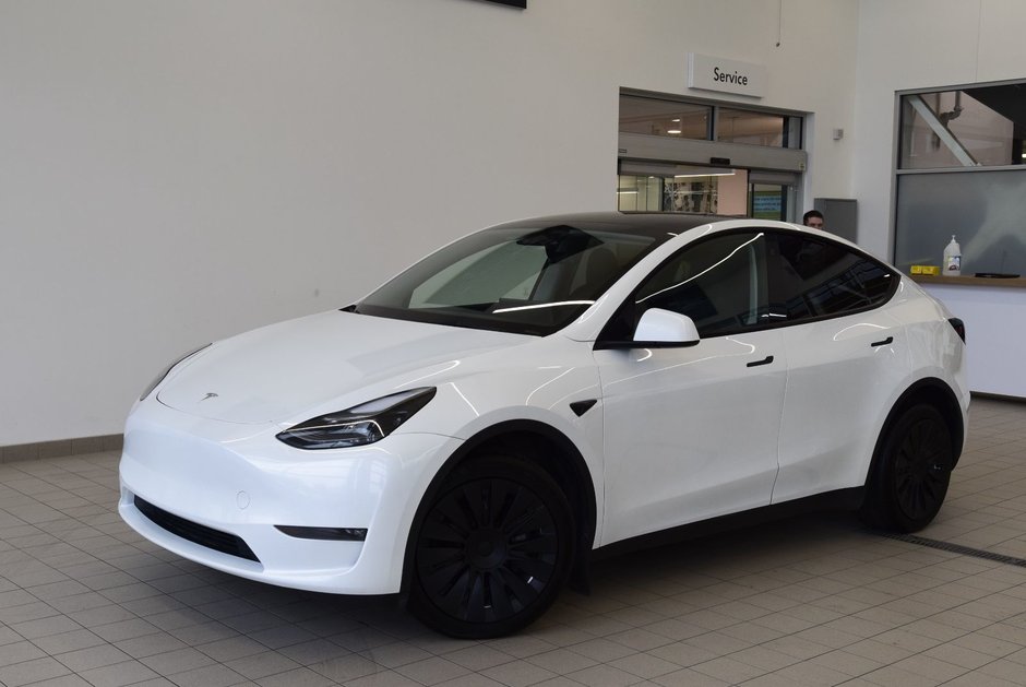 2023 Tesla Model Y LONG RANGE+AWD+BAS KM+ in Laval, Quebec